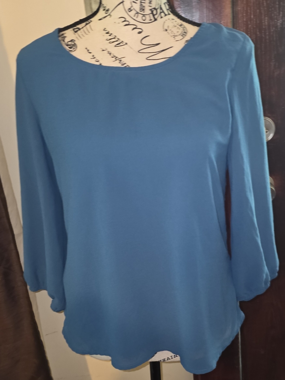 Society Girl blue, long-sleeve blouse W/ button-back design W/split Lower Hem
